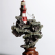 Illustration for article titled Artist transforms bonsai trees and empty cans into insane Lilliputian cities